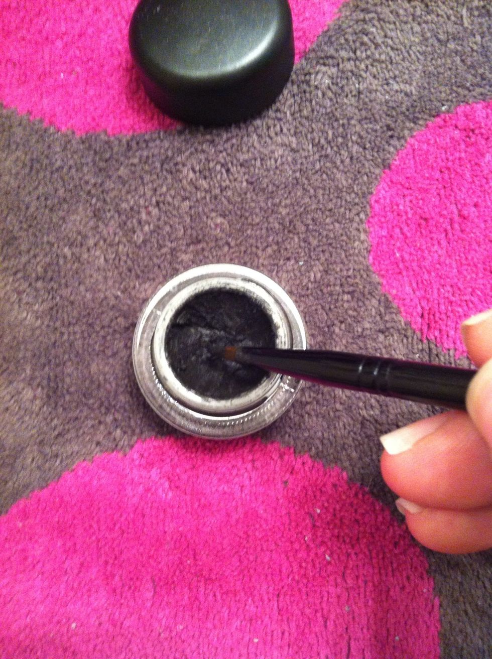Dip your MAC 209se brush into the eyeliner