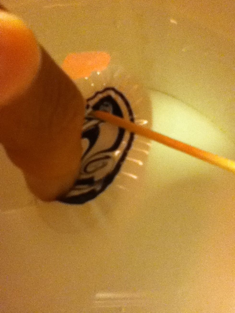 Dip your nail all the way in. Once the polish drys, take it off the water with a toothpick