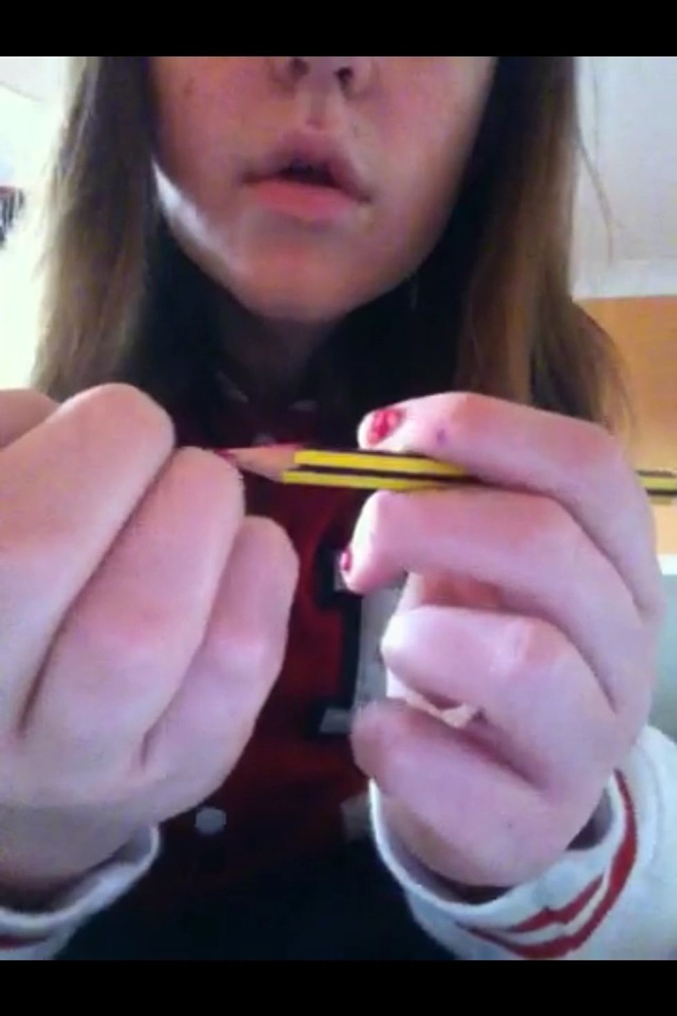 Dip your pencil into a different coloured nail varnish and draw a few more swirls on your nails. This creates a marble effect