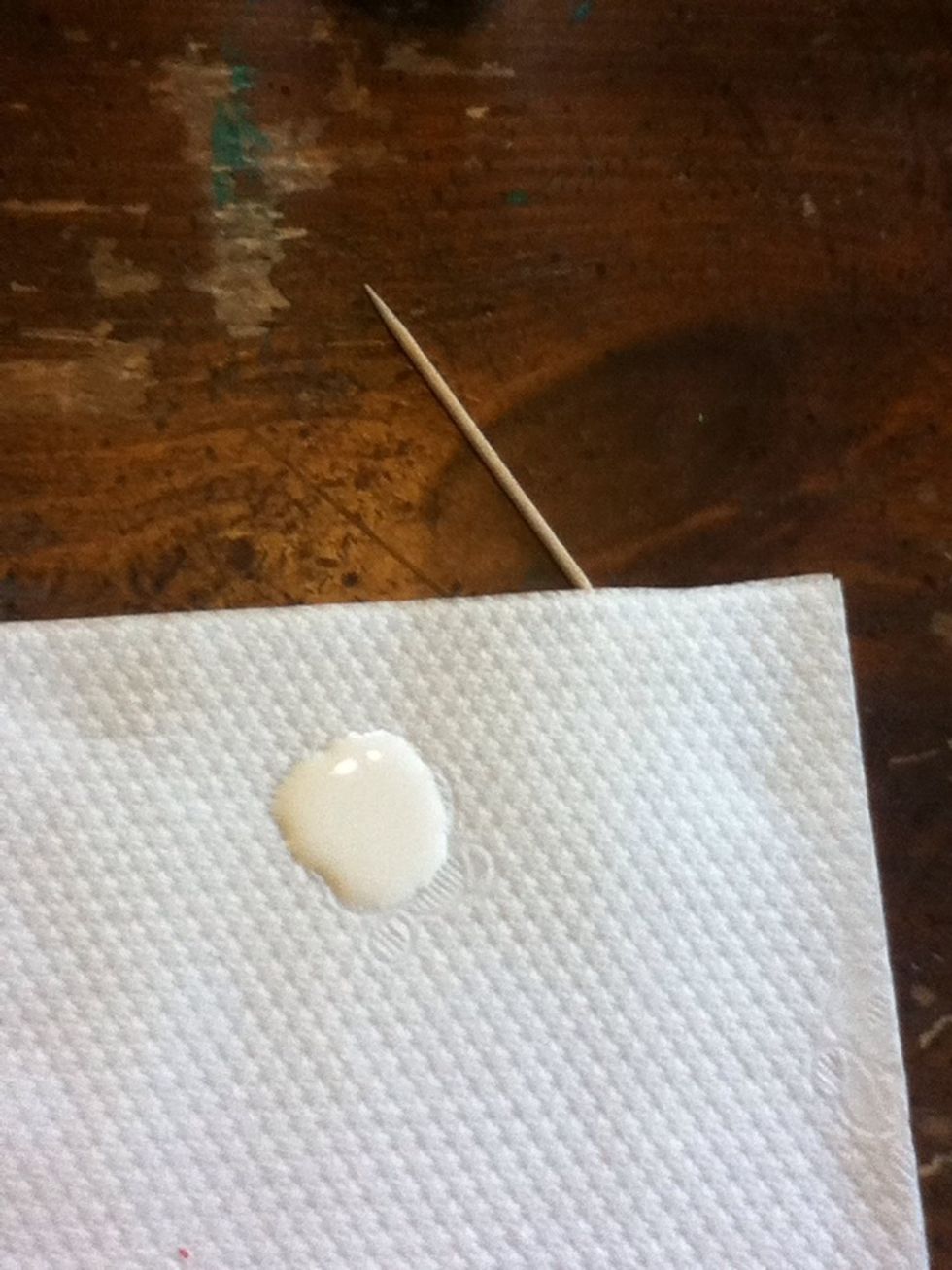 Dip your toothpick in white polish.