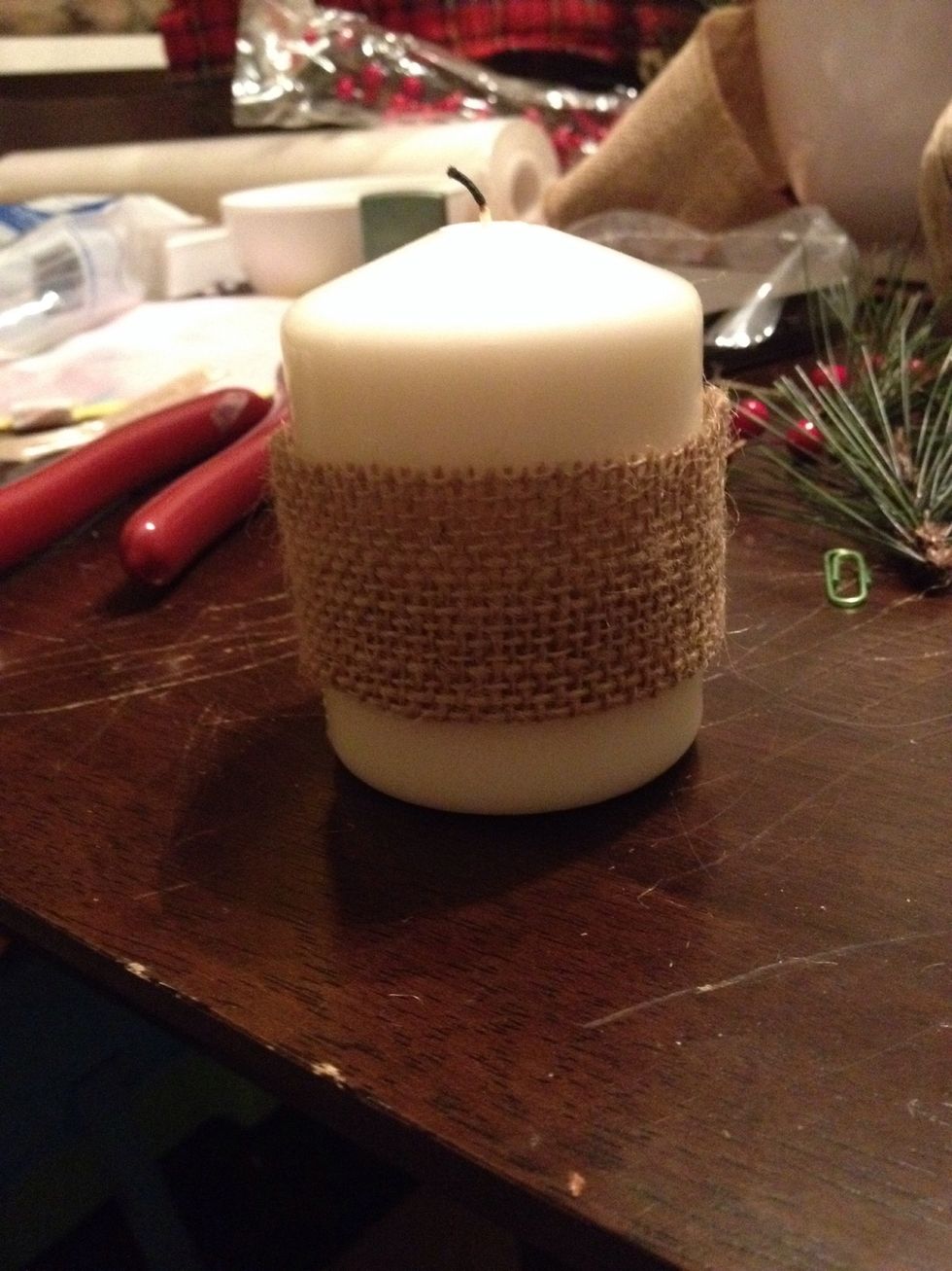 Directly opposite of the hot glue or the back, I placed a large bead of hot glue to fasten my greenery.