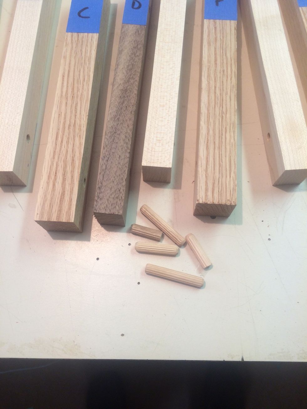 Disassemble the cutting board and remove the dowels