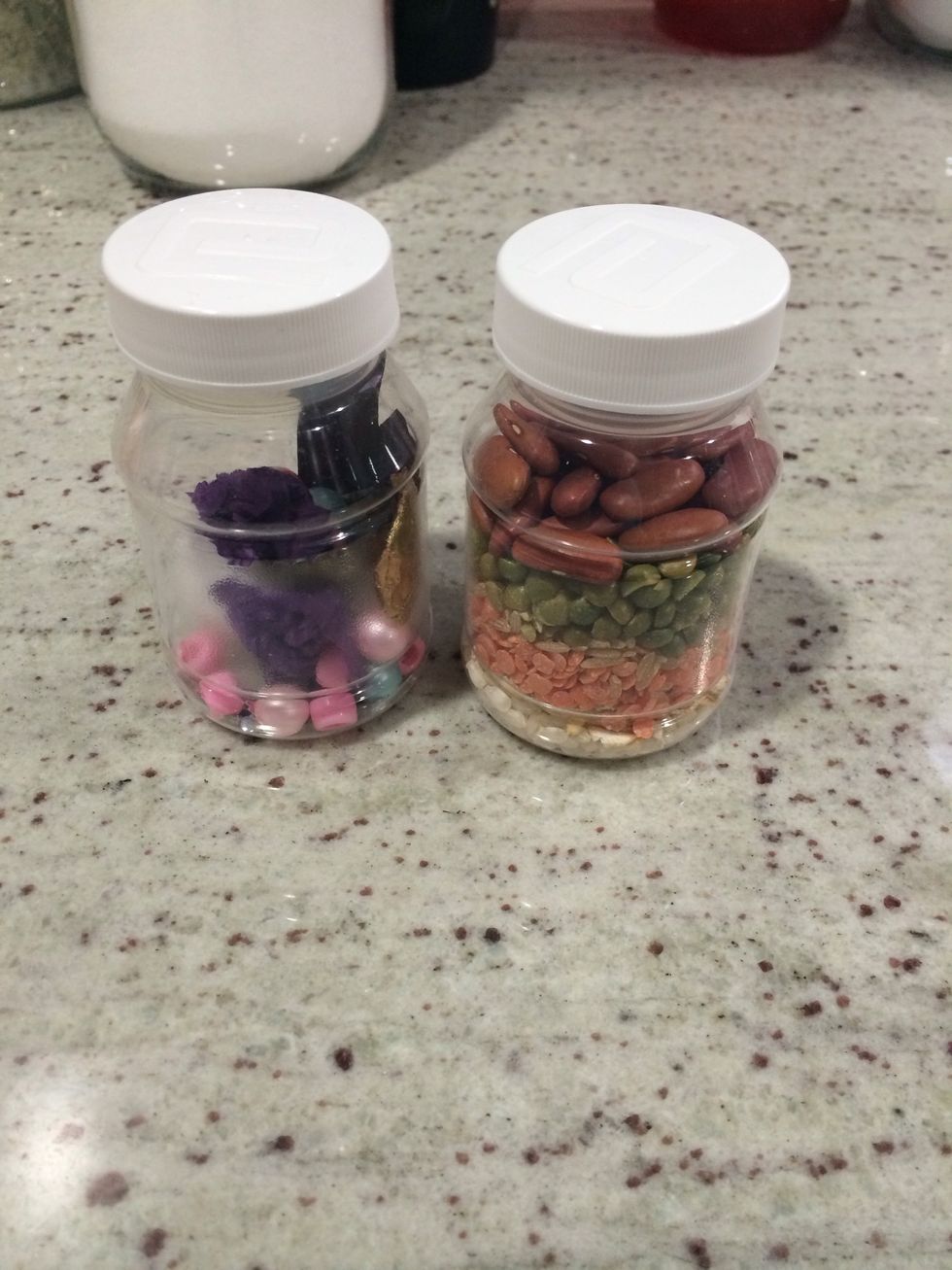 Discovery bottles can be filled with whatever random objects you find that could be interesting to look at and/or make sounds when shaken. You can also stick with one theme for a bottle.
