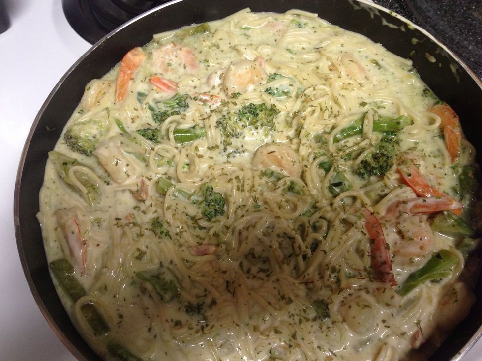 Dish is mixed well. Sprinkle parsley on top & cover to heat all the way through for about 5 minutes on medium heat