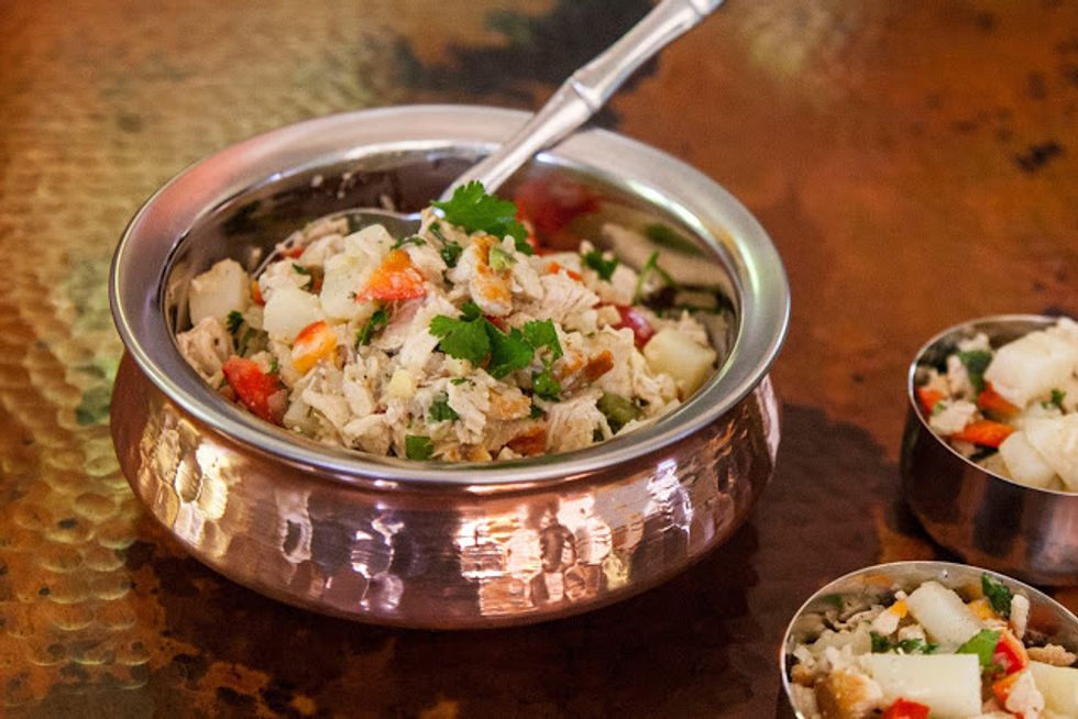 Dish it out and serve it up! This is a great salad and works both hot or cold. We wound up wrapping in in flatbread as roll ups since I was too lazy to get the chapattis fired up.