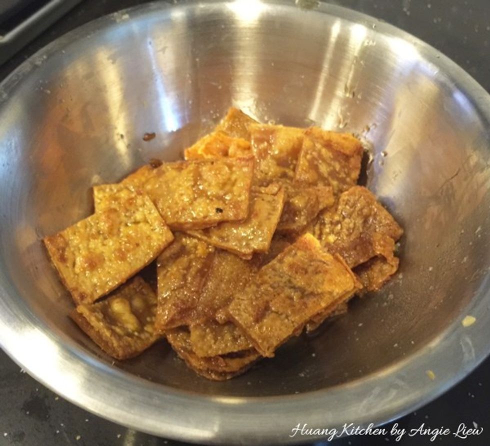 Dish up and set aside the fried sweet dried beancurd strips.
