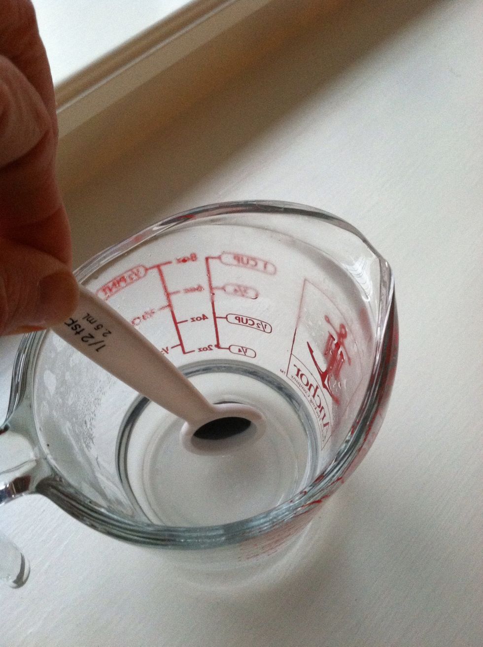 Dissolve 5/8 of a teaspoon of Borax crystals into 1/4 cup of hot water. Stir until borax completely dissolved.