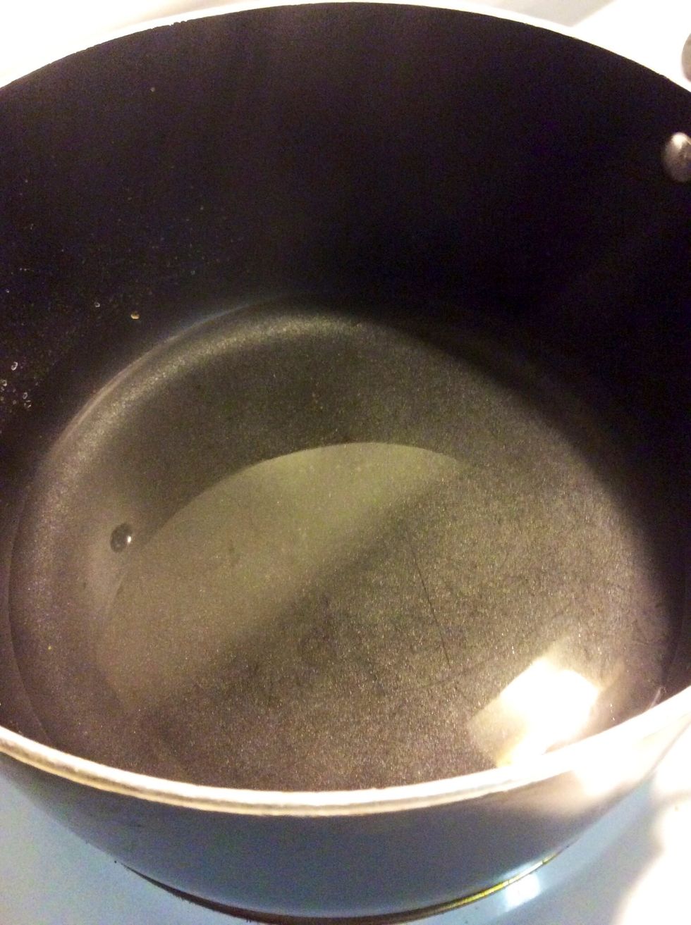 Dissolve baking soda in boiling water. Set aside
