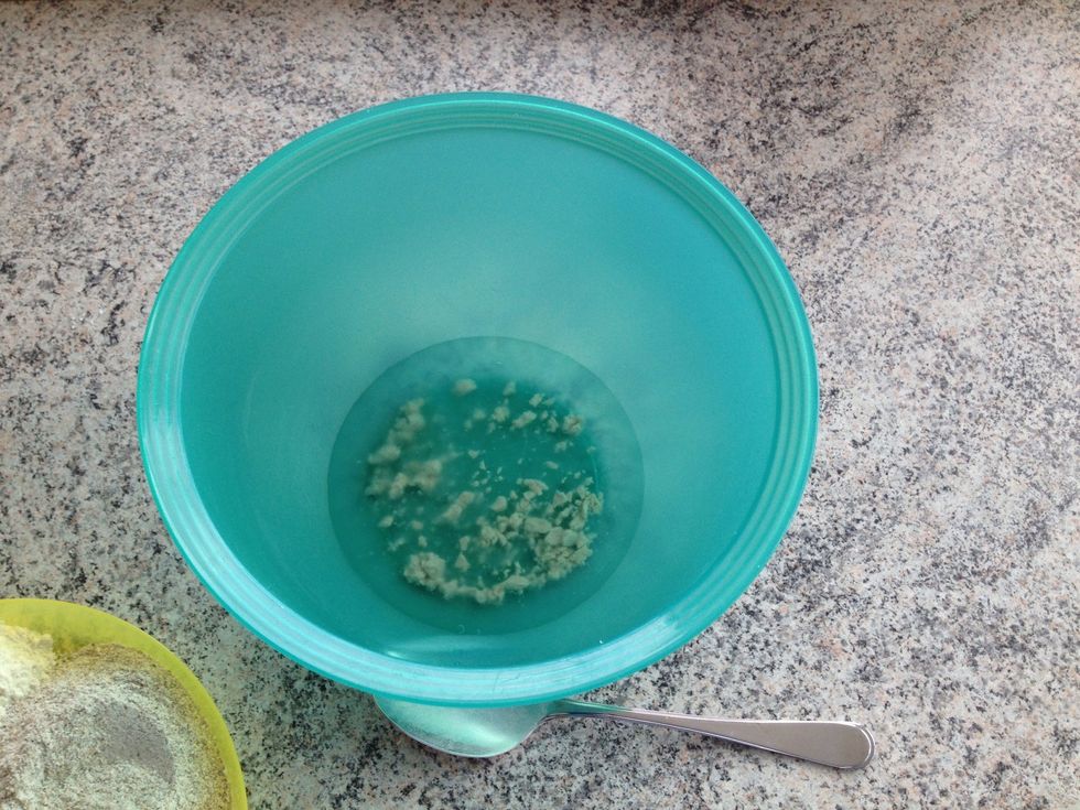 Dissolve the yeast in cold water