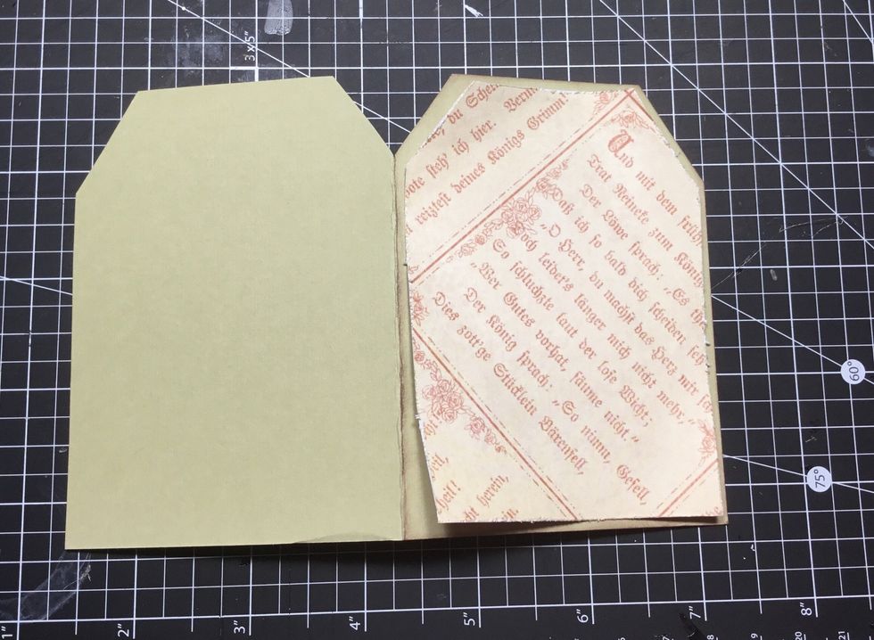 Distress and attach patterned paper tag to front of folded tag as shown.