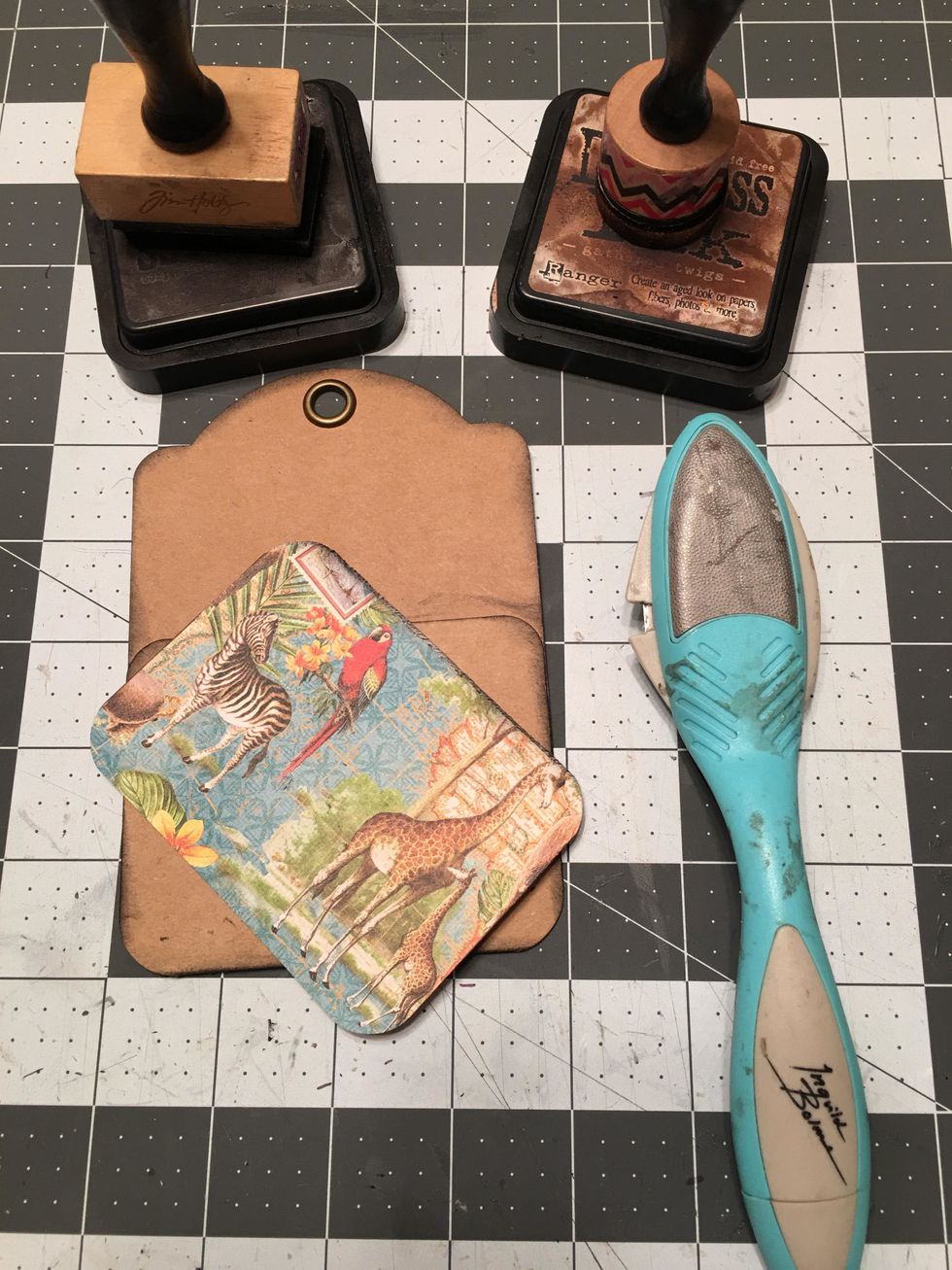 Distress and ink the top edge of the patterned paper that goes onto the pocket.