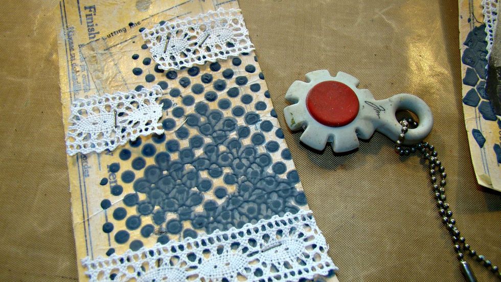 Distress the edges of your tags either using a distressed tool or your scissors.