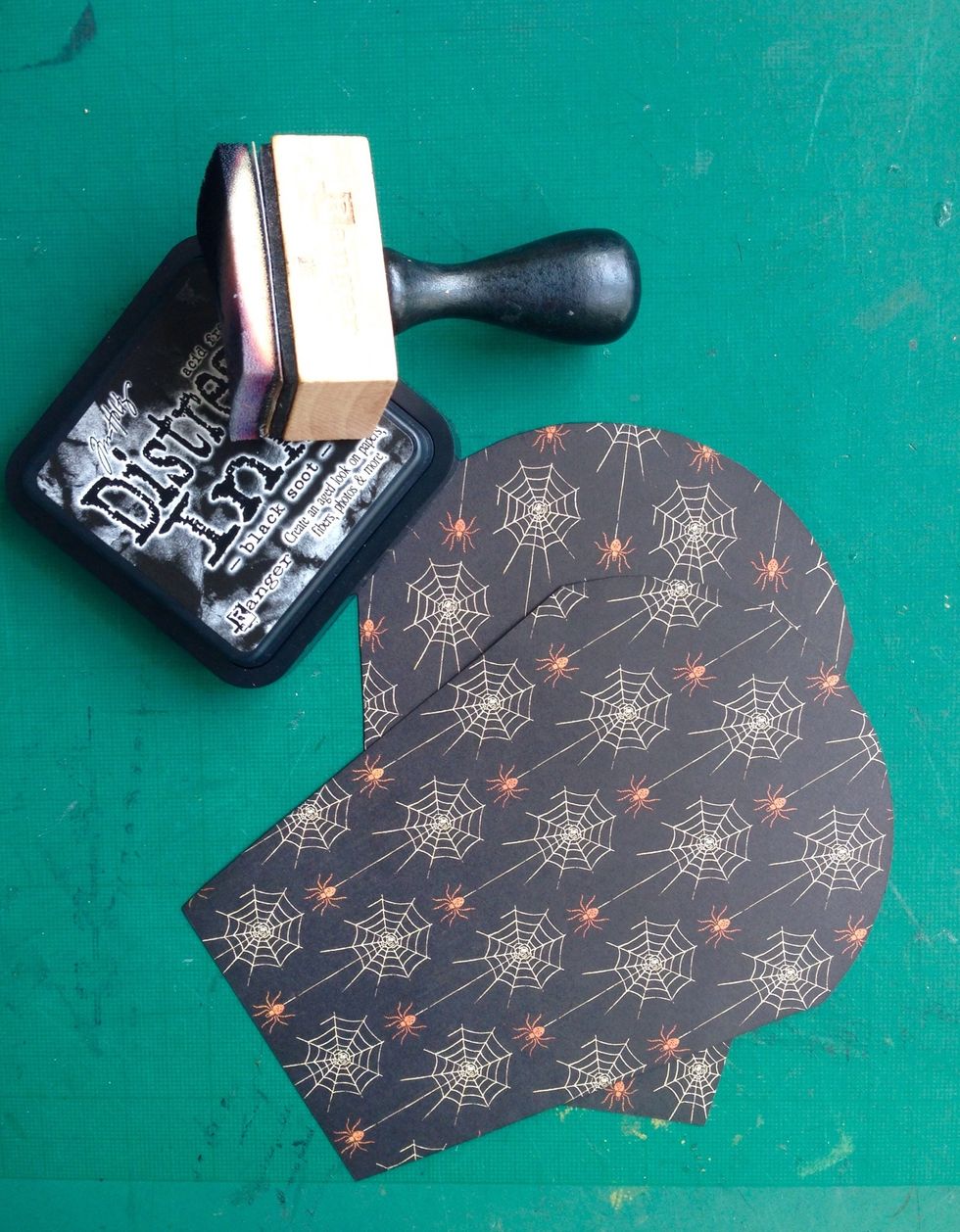 Distress the edges with black soot ink, if desired...