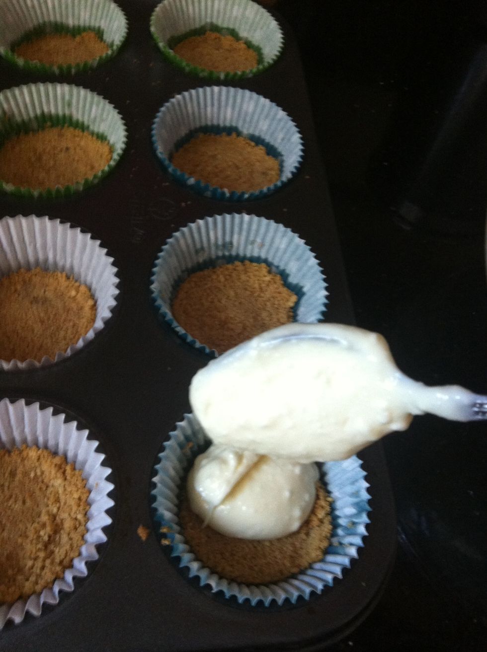 Distribute evenly among cupcakes.