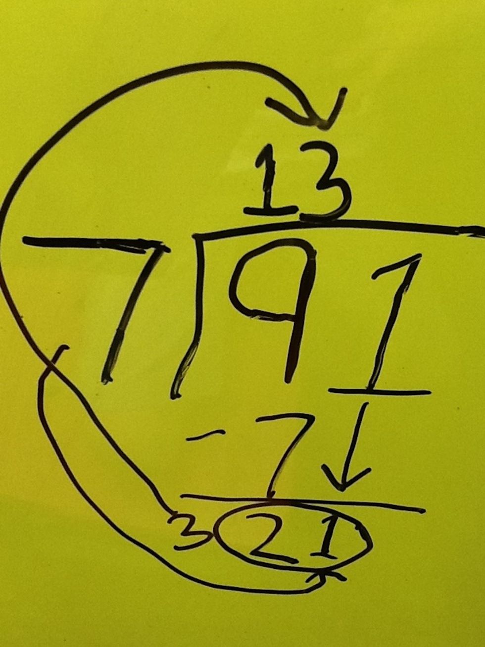 Divide 21 into 7 to get 3 then you put the 3 up top next to the one.