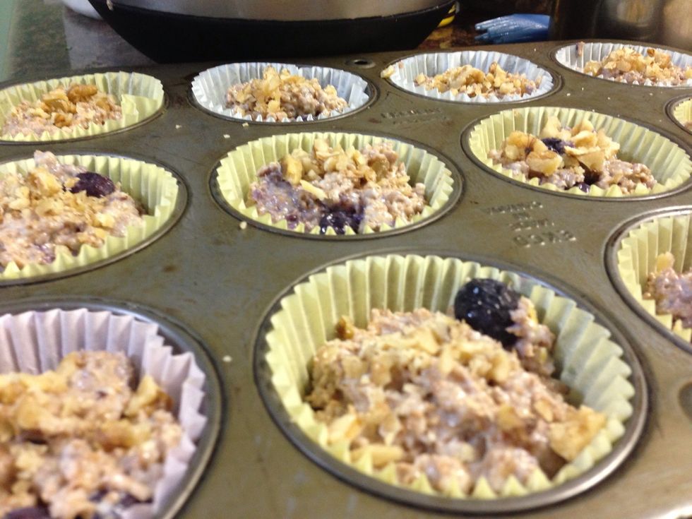 Divide batter evenly. You can fill them about 3/4 of the cup.