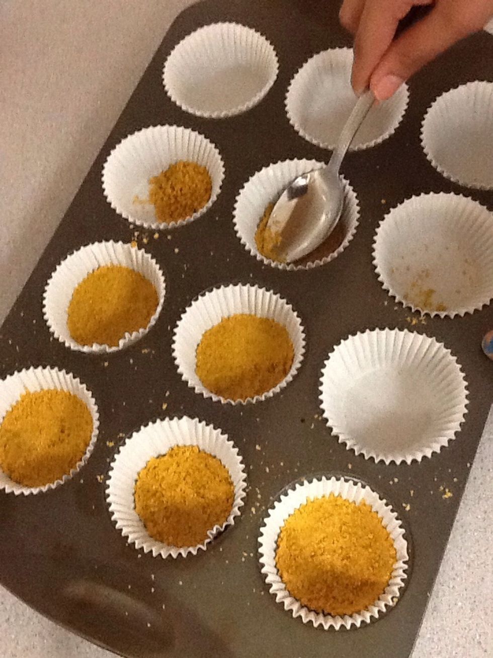 Divide crumb mixture evenly and compress with spoon. Bake for 5 min