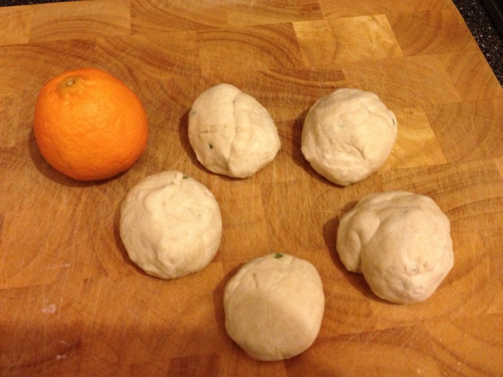 Divide dough into five or six tangerine sized balls - mine where on the small side ideally they need to be bigger!