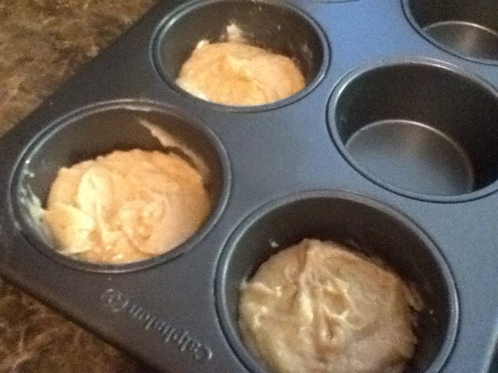 Divide evenly between the muffin cups.
