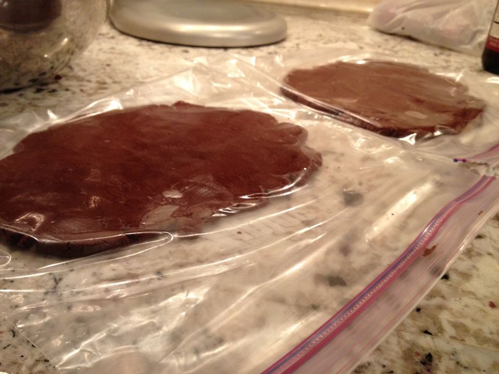 Divide it into two pieces and place in large ziplock bags. Flatten the dough out to about 3/4 inch in the bag. Chill in the freezer for 10-15 minutes, or until firm.
