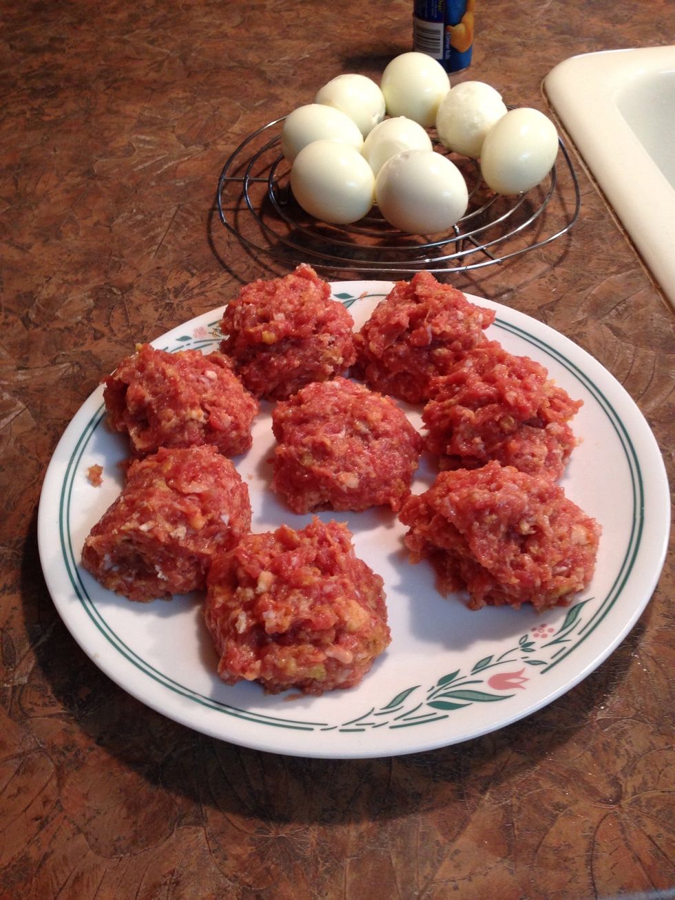 Divide meat mixture into 8 equal parts.