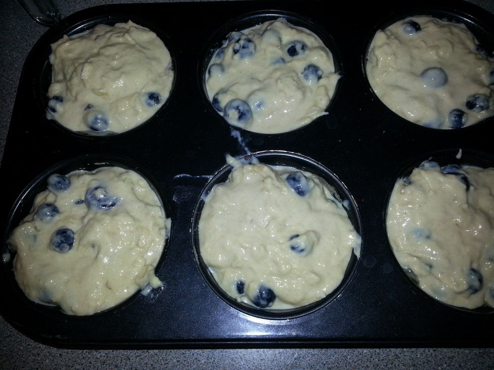 Divide the batter among the prepared muffin cups