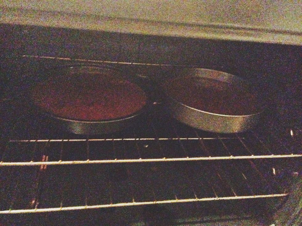 Divide the batter evenly between the prepared pans. Bake until a toothpick inserted into the center comes out clean, 40 to 45 minutes.