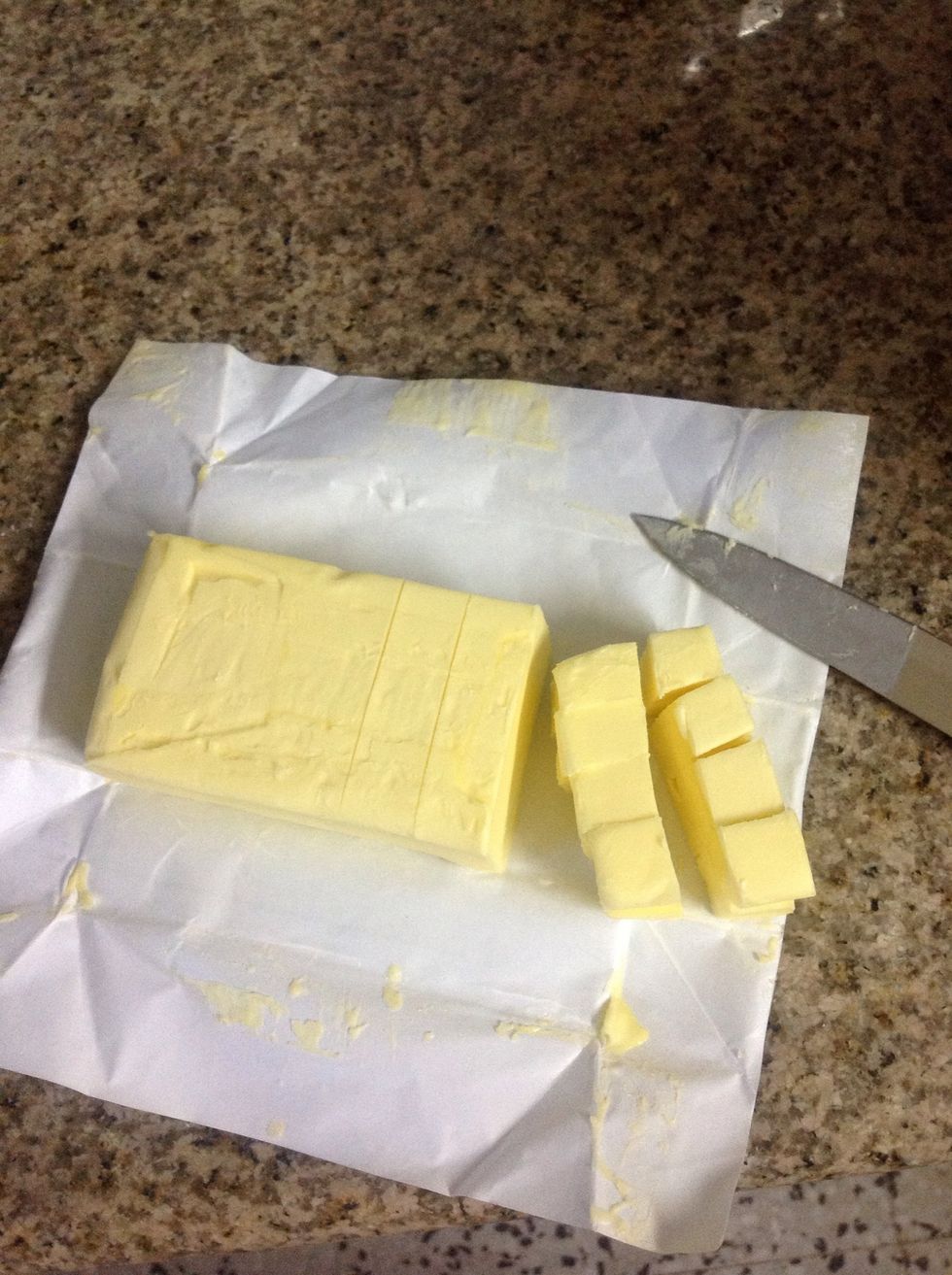 Divide the cold butter, you will need to cut out a 50 grams (1 3/4 oz) piece of butter and dice it up. You will be left with 125 grams (4.4 oz) of butter, set it aside.