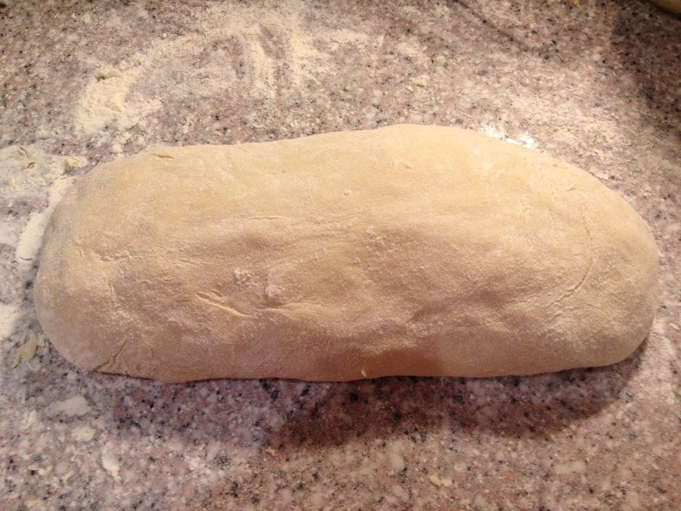 Divide the dough in two bread shaped lumps and put each in a plastic bag and let them rest in the fridge for 1/2-1 hour, not to rise but to " firm up"
