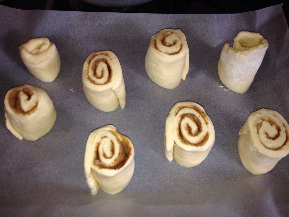 Divide the dough into 16 pieces and place them on their sides on baking paper.