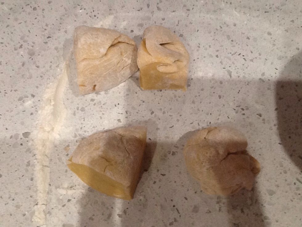 Divide the dough into four to make it easier for the pasta machine.