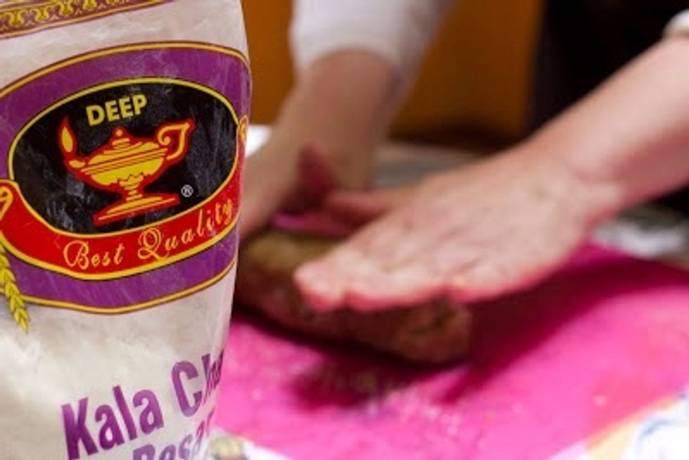 Divide the dough into three sections and roll each into a ball and then into 10 inch long logs of dough.