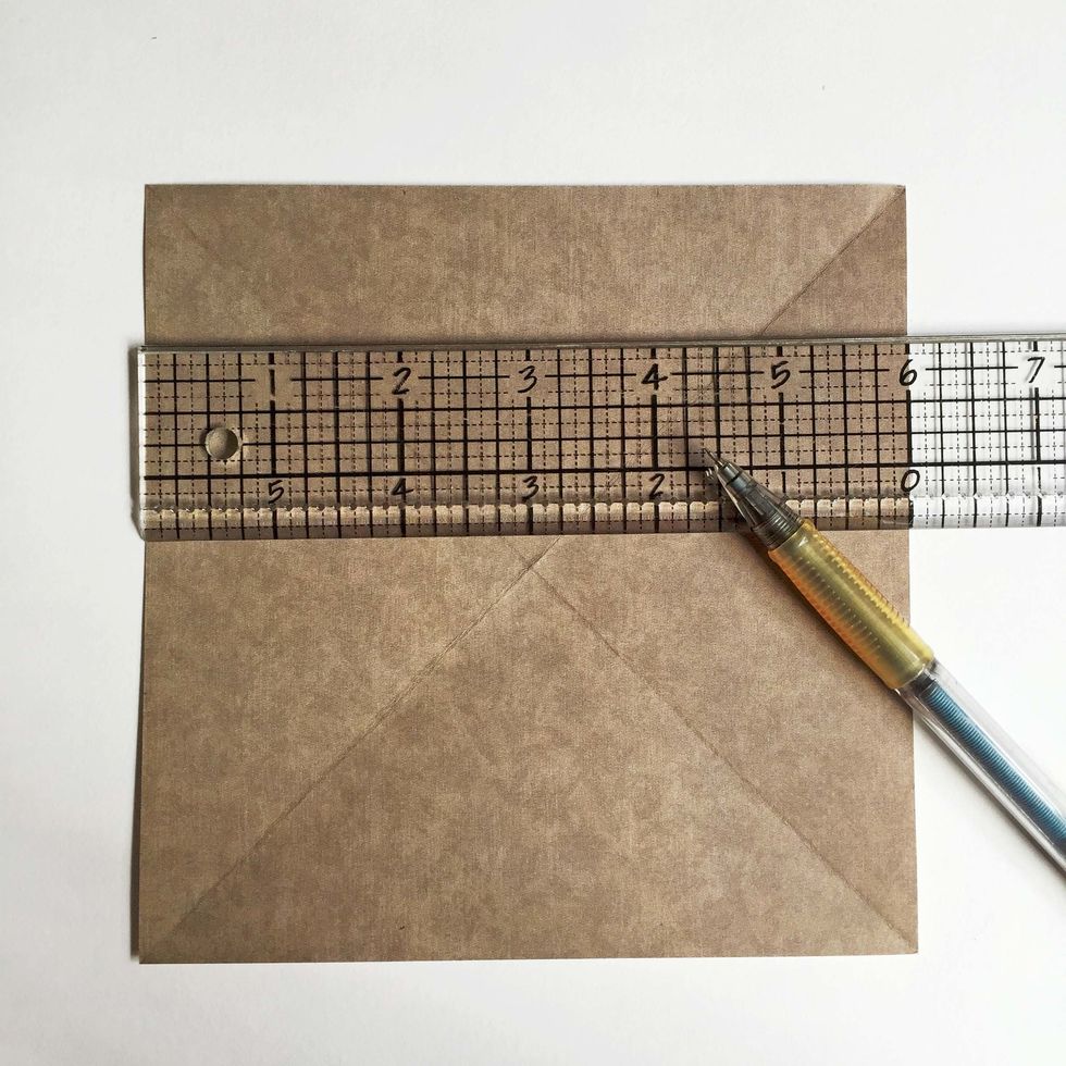Divide the paper into 3 equal columns... You may want to use a ruler to measure them equally... For this tutorial, I'm using a 6" x 6" paper, so it will be 2" per column...