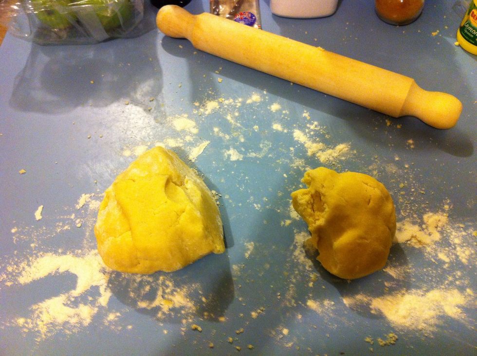 Divide the pastry- one piece being bigger than the other.