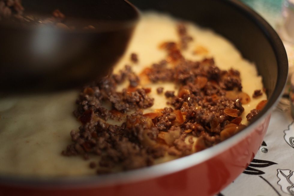 Divide your mashed potato in exact halves. Place one layer on the bottom until your tray is covered. Sorry I forgot to take that pic.