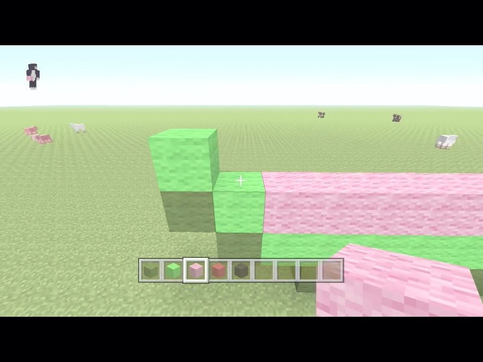 Do a diagonal shape with the light green wool