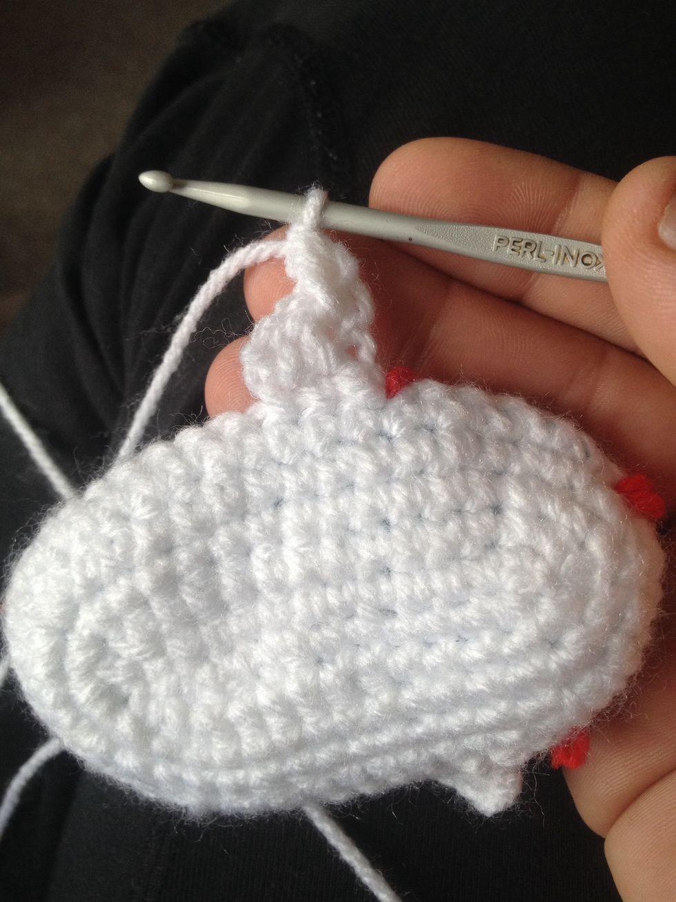 Do a Double crochet ( not a half) in same stitch as where you just chained 2