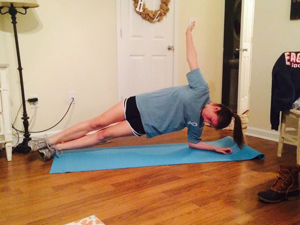 Do a left side plank for 30 seconds
