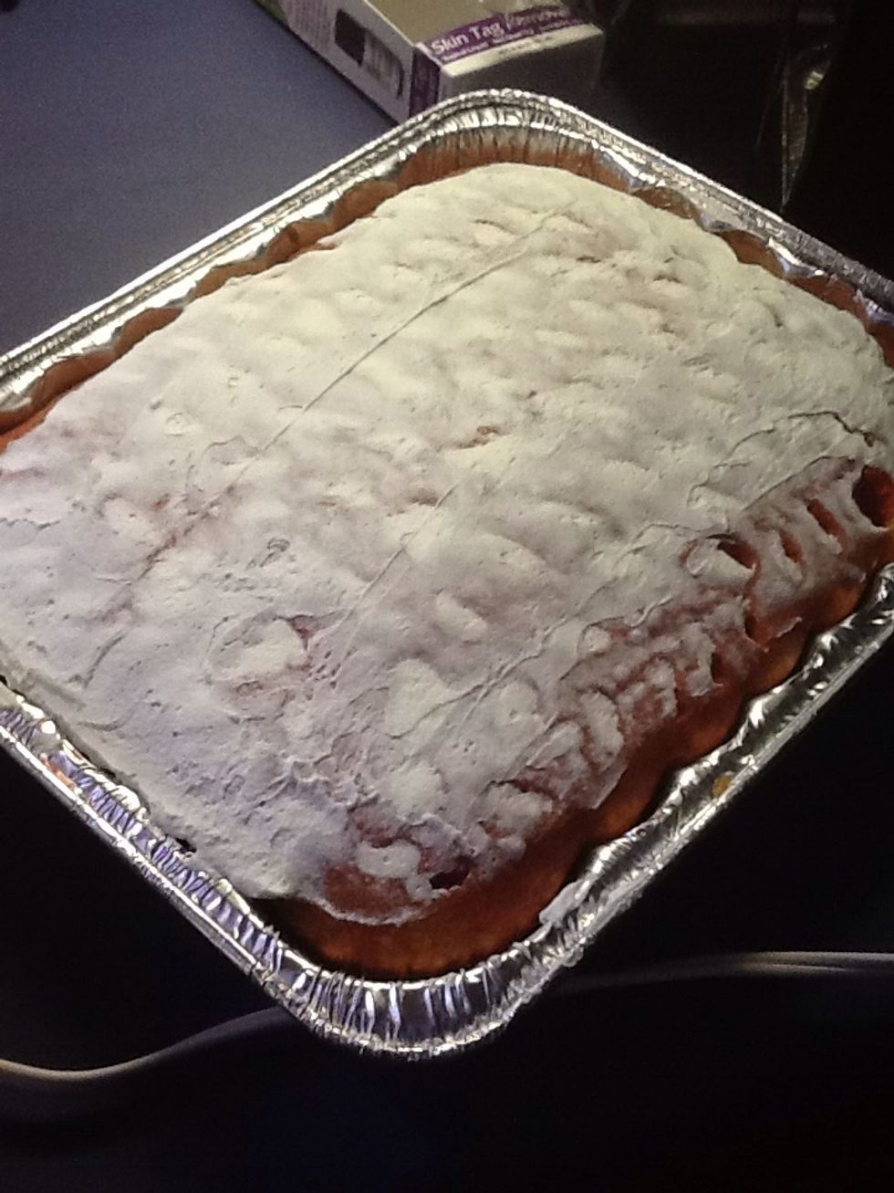 Do a light crumb coat first so there's no crumbs that come up in your finial coat.