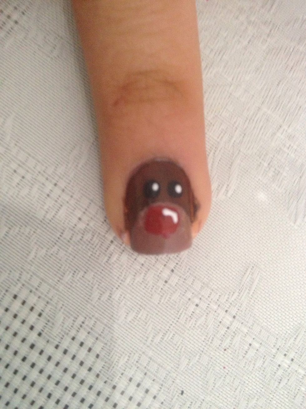 Do a little white stripe on the reindeers nose.