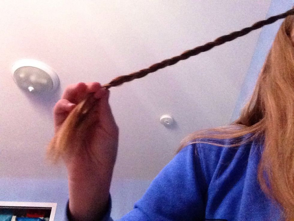 Do a regular braid and leave about an inch from the bottom loose