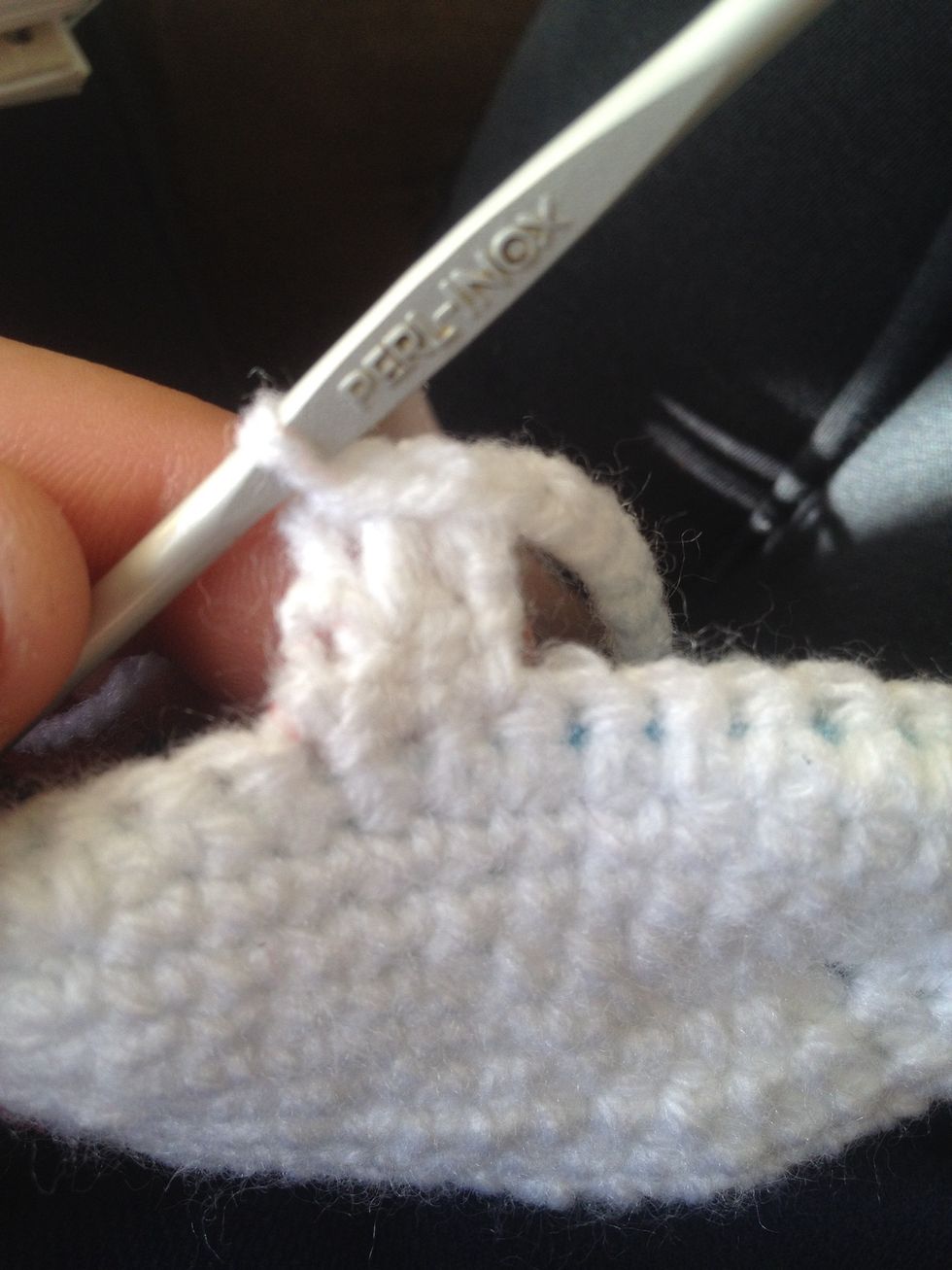 Do a slip stitch into the next 2 stitches