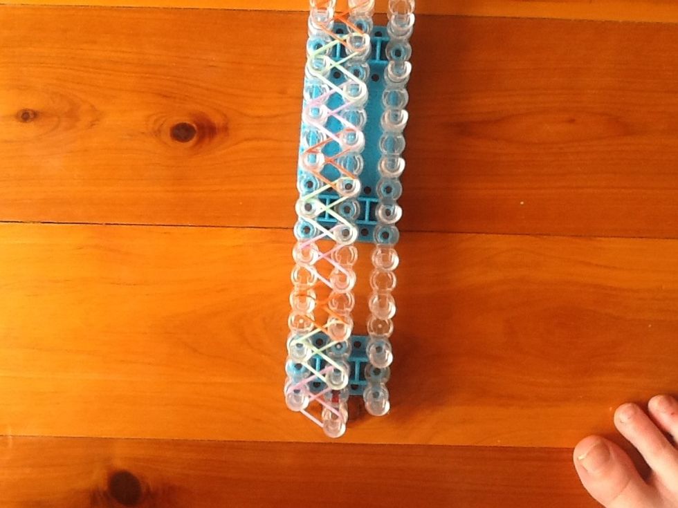 Do it up to about this. If you have a bigger wrist you can make it longer.