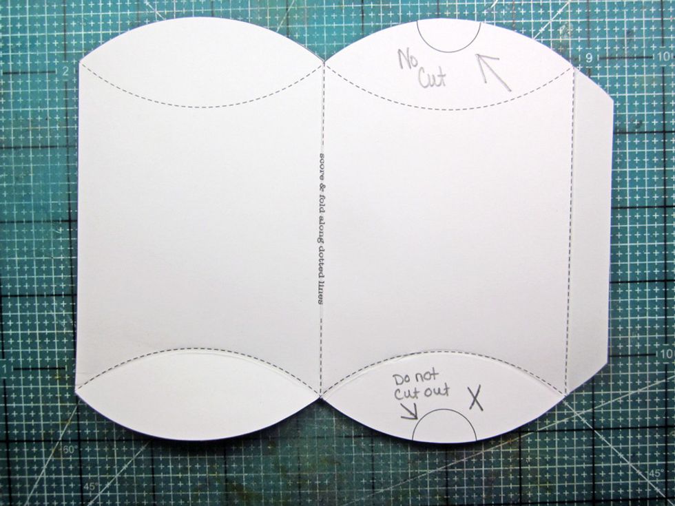 Do not cut out the notched tabs that show for the pillow box. I've marked X's on the template to show you what not to cut.