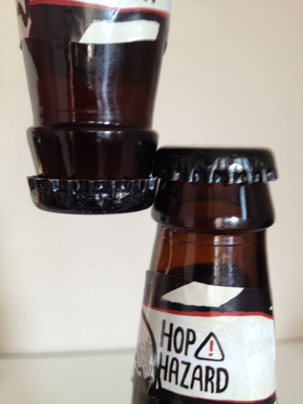 Do not do this. You will spill beer when #2 opens. Might work a few times but you will spill beer at some point.