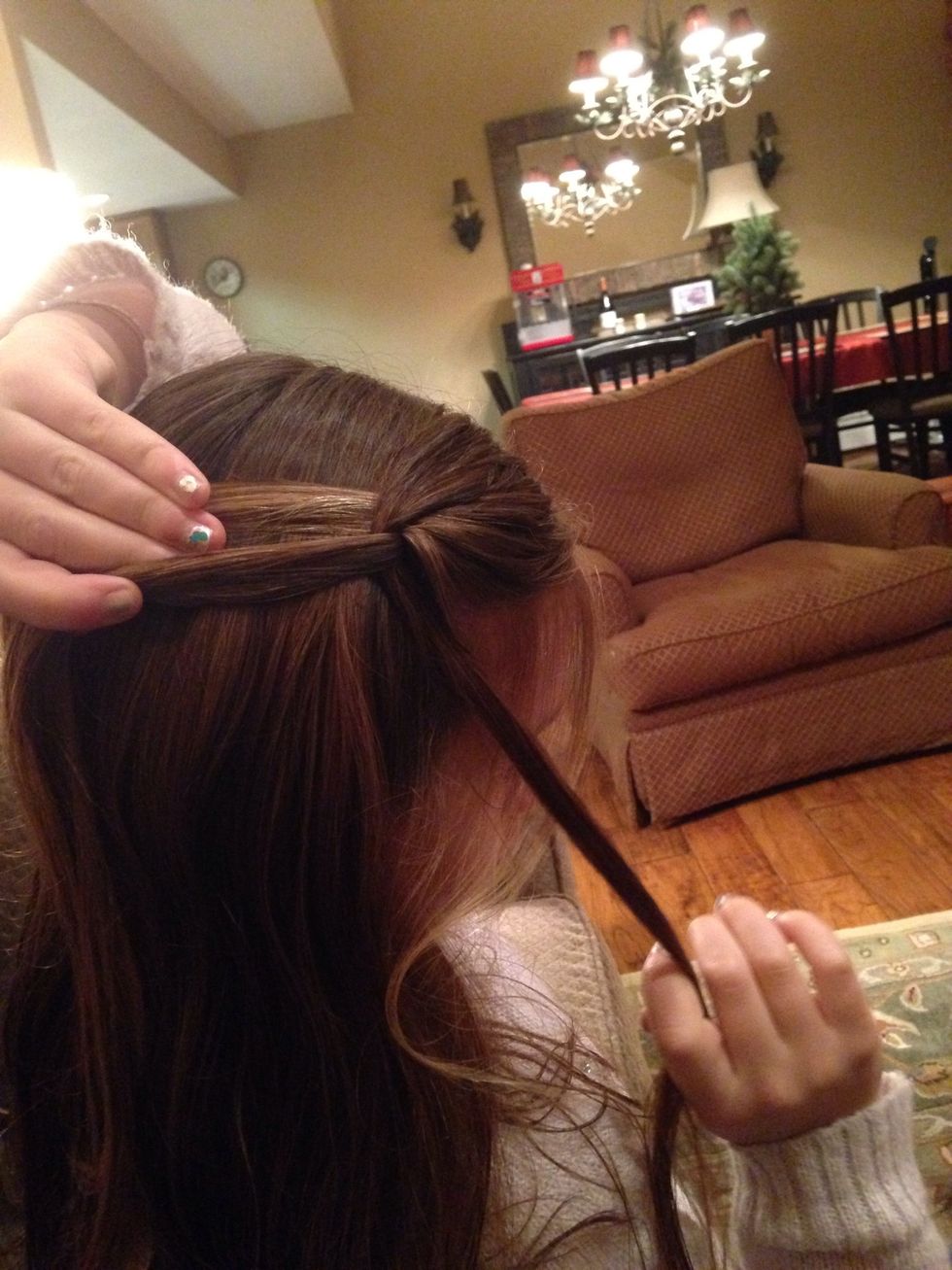 Do one stitch of a regular braid