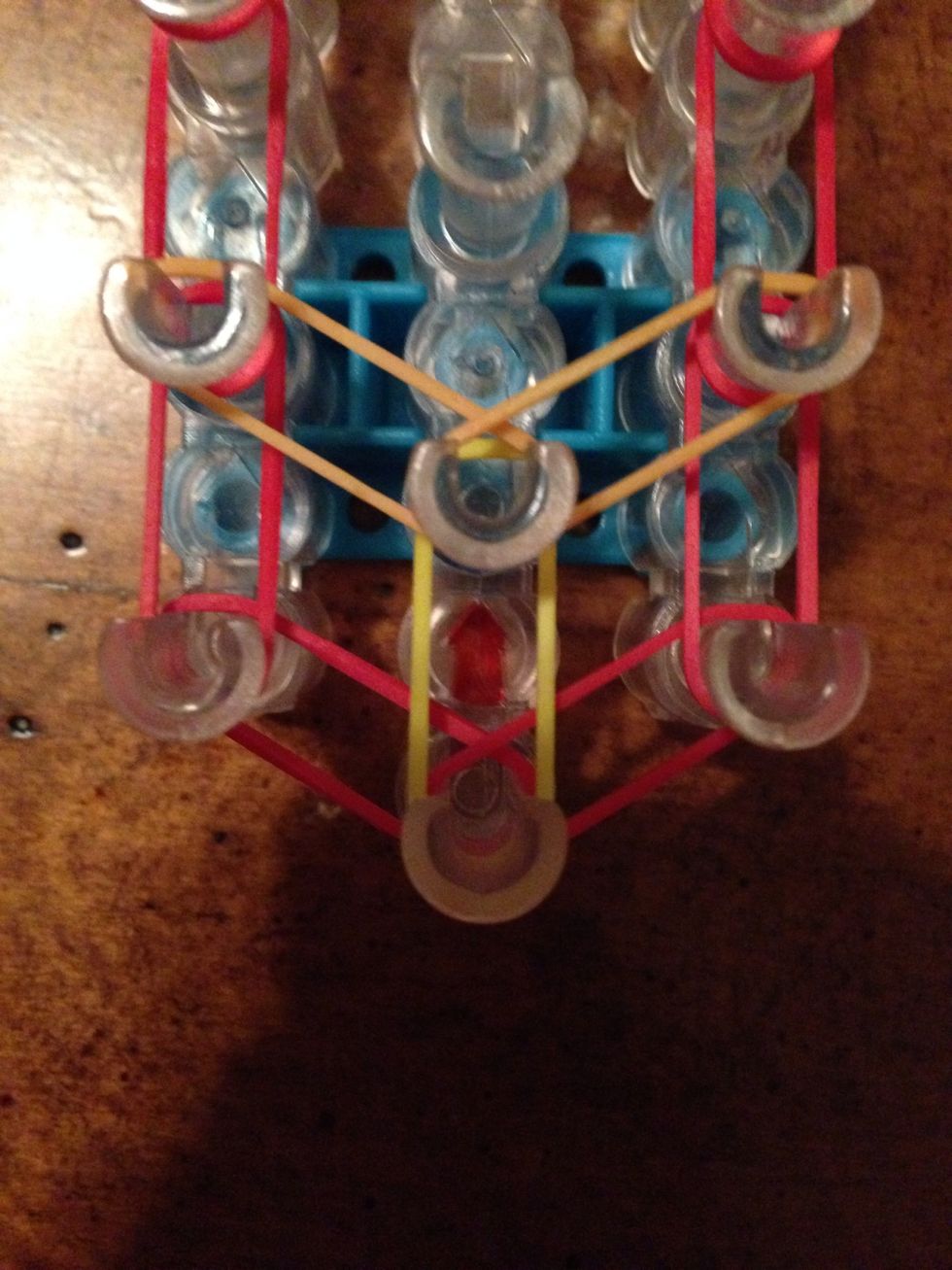 Do that to the other side it should look like a "Y" when you are done