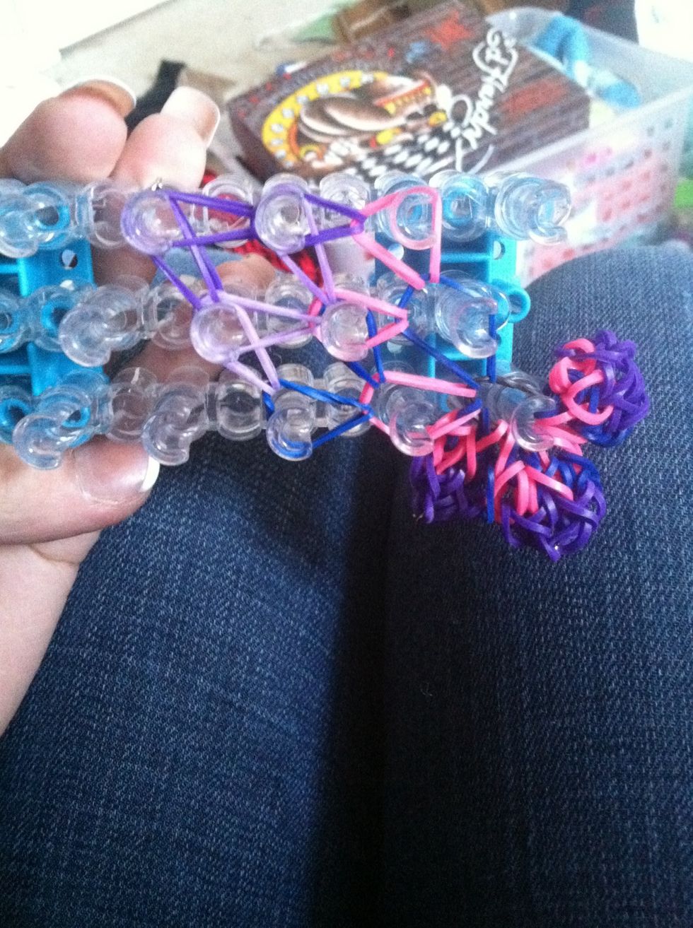 Do that until the forth petal. When you get to the last petal on your loom. Finish the petal like normal. You will only have 4 petals..