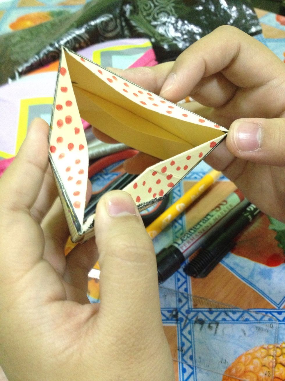 Do the previous step on all the three sides.