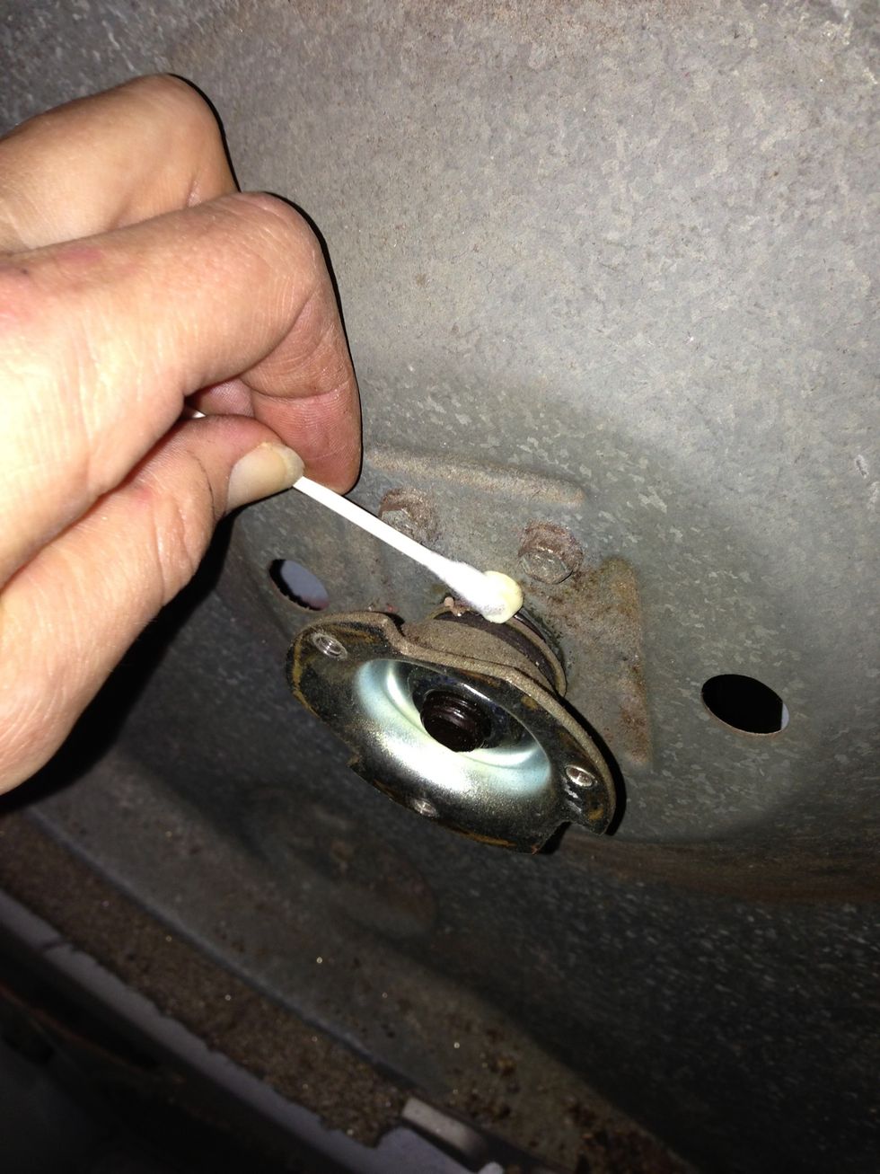 Do the same around the washer on the part of the bearing that is inside the machine. This will hopefully stop the metal from screeching as the drum turns.